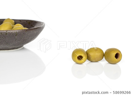Green marinated olive isolated on white Green marinated olive isolated on white 58699266