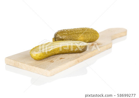 Sour green pickles isolated on white Sour green pickles isolated on white 58699277