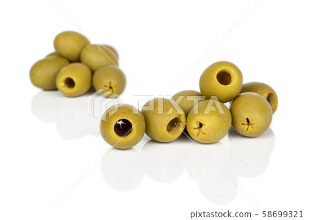 Green marinated olive isolated on white Green marinated olive isolated on white 58699321