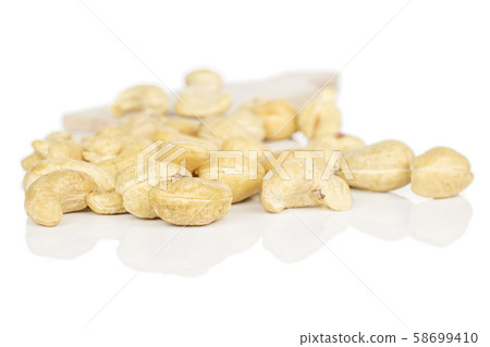 Fresh cashew nut isolated on white Fresh cashew nut isolated on white 58699410
