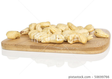 Fresh cashew nut isolated on white Fresh cashew nut isolated on white 58699766