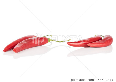 Red hot cayenne chili isolated on white Red hot cayenne chili isolated on white 58699845