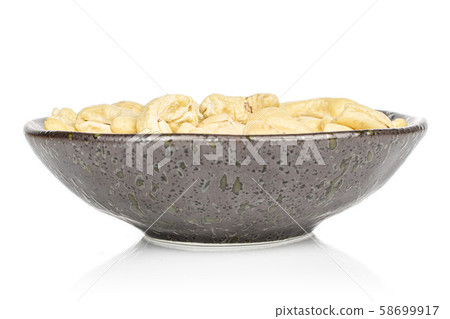 Fresh cashew nut isolated on white Fresh cashew nut isolated on white 58699917