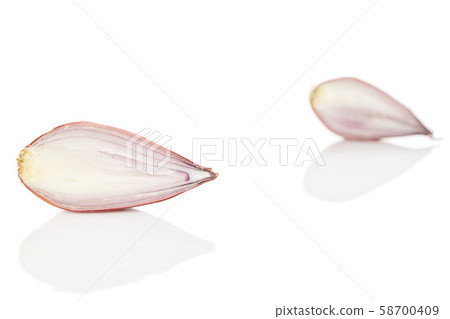 Fresh brown shallot isolated on white Fresh brown shallot isolated on white 58700409