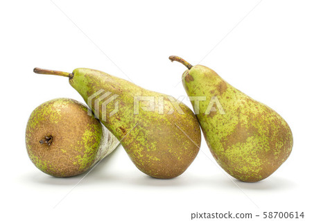 Fresh green conference pear isolated on white Fresh green conference pear isolated on white 58700614