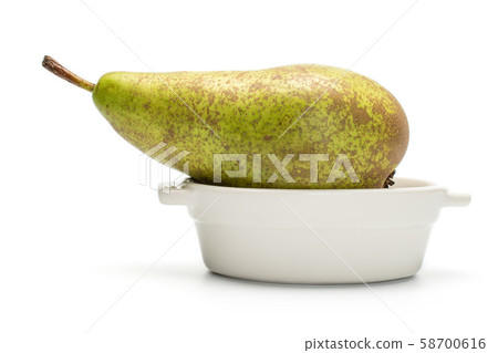 Fresh green conference pear isolated on white 58700616