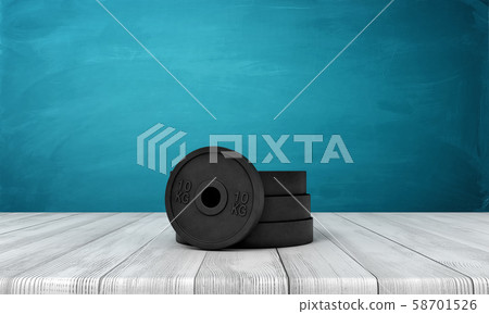 3d rendering of black weight plates on white wooden floor and dark turquoise background 58701526