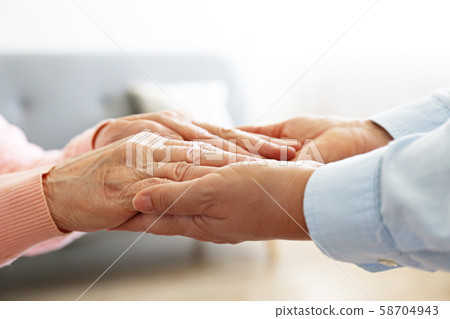 Close up shot of an alderly woman in spacious room 58704943