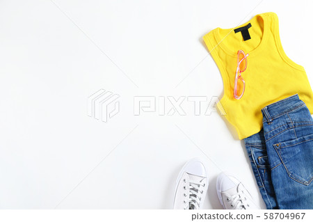 Fashionable clothing set lying on white 58704967