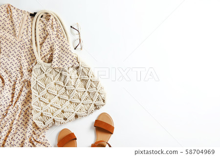 Fashionable clothing set lying on white 58704969