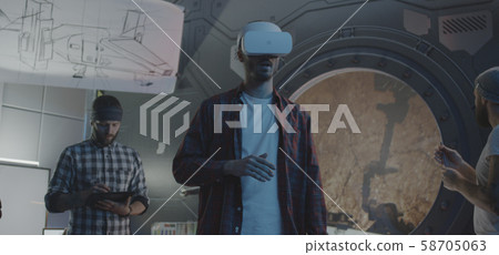 Developers testing VR video game Developers testing VR video game 58705063