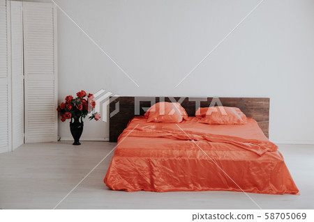 the Interior of the white room with a bed with red the Interior of the white room with a bed with red 58705069