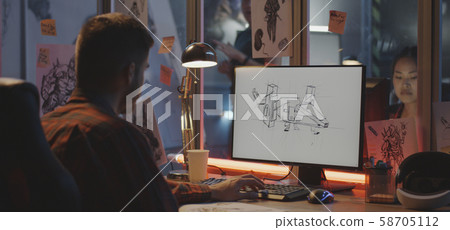 Graphic designer drawing video game art 58705112