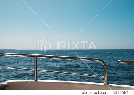 ocean and blue sky / sea view horizon behind boat ocean and blue sky / sea view horizon behind boat 58705643