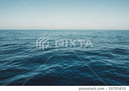 Calm sea surface with waves at sunny day - ocean Calm sea surface with waves at sunny day - ocean 58705650