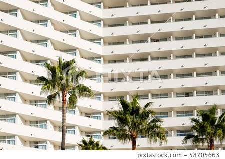 facade hotel or apartment building palm trees facade hotel or apartment building palm trees 58705663