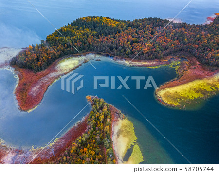 Aerial view over the lake with capes and bendings 58705744