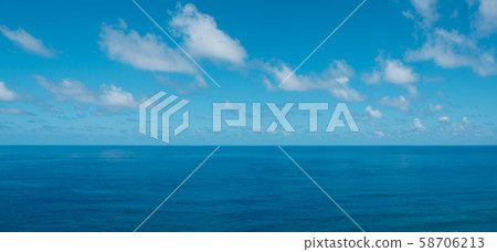 blue sky with clouds over water - ocean horizon , blue sky with clouds over water - ocean horizon , 58706213