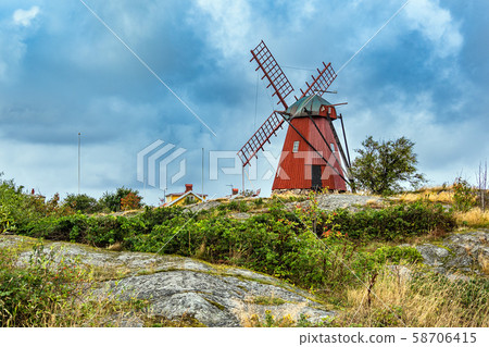 View to a windmill in Molloesund in Sweden View to a windmill in Molloesund in Sweden 58706415