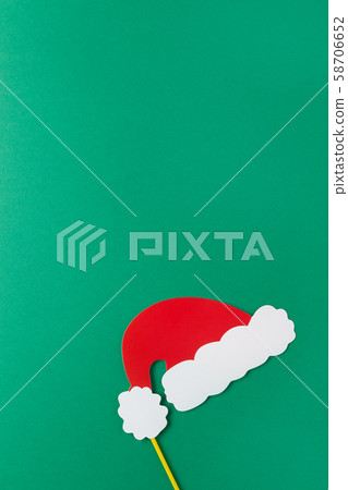 Christmas decoration, red Santas hat on stick on Christmas decoration, red Santas hat on stick on 58706652