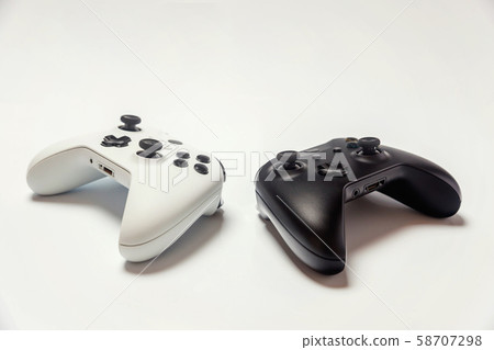 White and black joystick on white background White and black joystick on white background 58707298