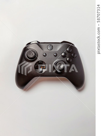 Black joystick on white background Black joystick on white background 58707314