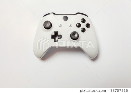 White joystick on white background White joystick on white background 58707316