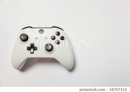 White joystick on white background White joystick on white background 58707318