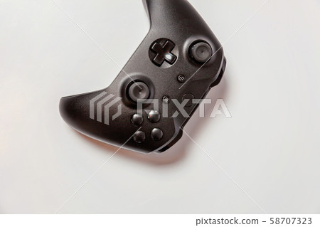 Black joystick on white background Black joystick on white background 58707323