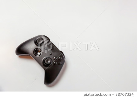 Black joystick on white background Black joystick on white background 58707324