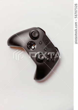 Black joystick on white background Black joystick on white background 58707326