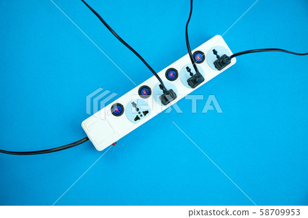 Electric power socket and plug on blue paper 58709953