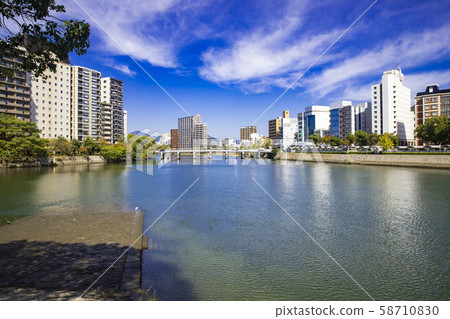 Blue sky and cityscape along the river Blue sky and cityscape along the river 58710830