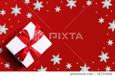 Christmas gift box with snowflakes Christmas gift box with snowflakes 58710986
