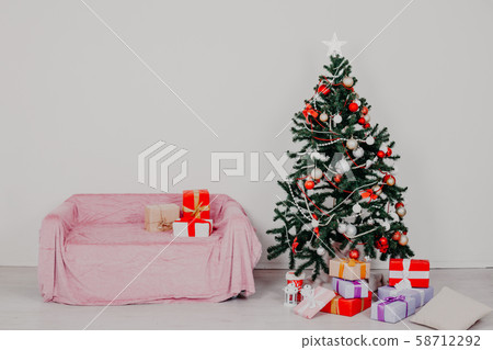 new year Christmas decor with Christmas tree sofa and gifts new year Christmas decor with Christmas tree sofa and gifts 58712292
