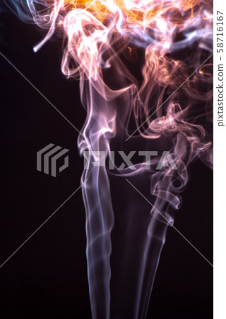 Beautiful smoke on the black background - macro photo 58716167