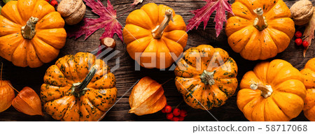 Autumn decorative pumpkins with fall leaves Autumn decorative pumpkins with fall leaves 58717068