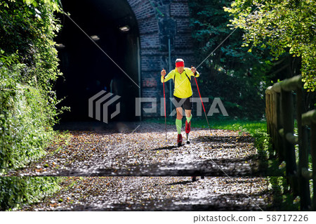 Cross-country skier is prepared with roller 58717226