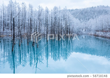First snow's blue pond First snow's blue pond 58718148
