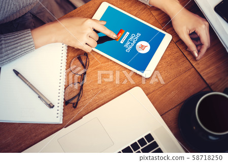 online shopping website on tablet screen with female hands typing password for security payment online. woman using digital tablet to shop online , e-commerce and security payment protection 58718250