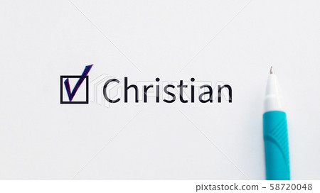 Christian - checkbox with a tick on white paper with blue pen. Checklist concept. I agree and vote for this, this is my choice. Christian - checkbox with a tick on white paper with blue pen. Checklist concept. I agree and vote for this, this is my choice. 58720048