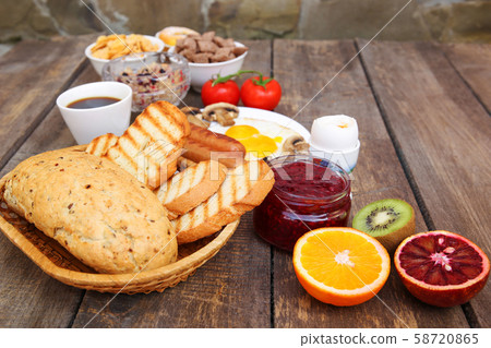 Healthy food on old wooden background. Breakfast. 58720865