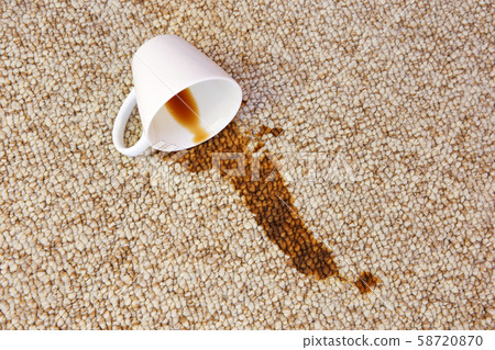 Cup of coffee fell on carpet. Stain is on floor. Cup of coffee fell on carpet. Stain is on floor. 58720870