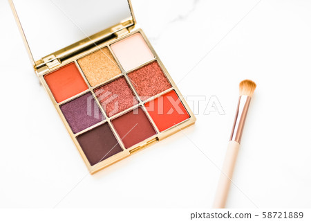 Eye shadow palette on marble background, make-up 58721889