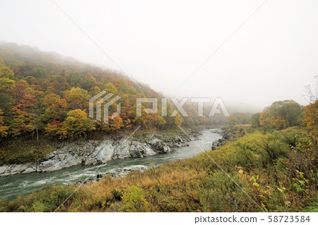 Hokkaido, Kami Kofun, Ishikarigawa difficult place rapids and autumnal scenery 58723584