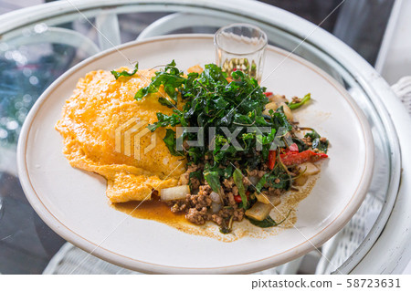 stir fried minced pork with basil and fried egg 58723631