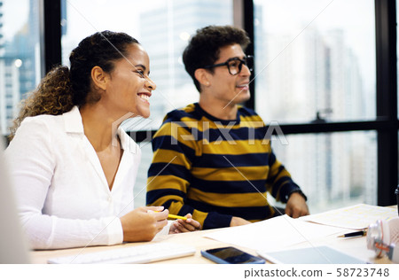 Business man and Business woman meeting and discuss for work in the offices. Business man and Business woman meeting and discuss for work in the offices. 58723748