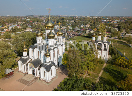 Aerial summer view of Nikolsky Monastery wiht bright golden domes is a Russian Orthodox monastery in 58725330