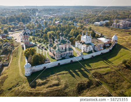 Aerial summer view of Pereslavl-Zalessky and old Goritsky Monastery with shadows from domes. Golden 58725355