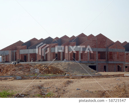 Double story luxury terrace house under construction in Malaysia.  Designed by the architect with a modern and contemporary style. 58725547